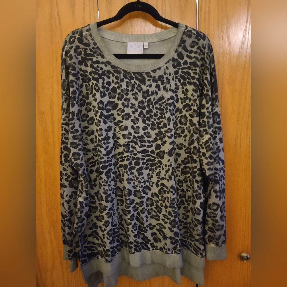 Plus size shirt.  Olive and black. High to low hem.  Animal print.